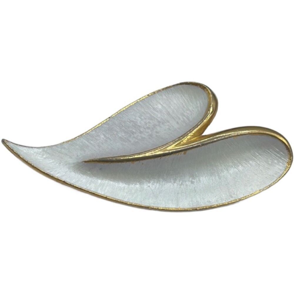 Vintage J.J. Brooch Modernist white enamel on gold colored metal.